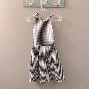 A black and white stripped dress by “So” size XS